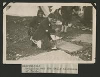 Weighing out the daily allowance of food, Macronissi (photograph), circa 1922<blockquote class="juicy-quote">Photo taken at the refugee camps on the island of Macronissi, Greece after the evacuation of Smyrna (Izmir), Turkey.</blockquote><div class="view-evidence"><a href="https://doctorordoctress.org/islandora/object/islandora:1492/story/islandora:1500" class="btn btn-primary custom-colorbox-load"><span class="glyphicon glyphicon-search"></span> Evidence</a></div>