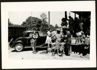 American Women's Hospitals, Rural Services mobile clinic vaccinating a woman (photograph), circa 1935<blockquote class="juicy-quote">An American Women’s Hospital doctor (in hat and “AWH” armband) administers a shot to a local woman in Jellico, Tennessee.</blockquote><div class="view-evidence"><a href="https://doctorordoctress.org/islandora/object/islandora:1859/story/islandora:2086" class="btn btn-primary custom-colorbox-load"><span class="glyphicon glyphicon-search"></span> Evidence</a></div>
