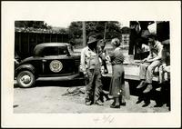 American Women's Hospitals, Rural Services mobile clinic vaccinating a man (photograph), circa 1935<blockquote class="juicy-quote">An American Women’s Hospital doctor ( in “AWH” armband) administers a shot to a local man in Jellico, Tennessee.</blockquote><div class="view-evidence"><a href="https://doctorordoctress.org/islandora/object/islandora:1859/story/islandora:2088" class="btn btn-primary custom-colorbox-load"><span class="glyphicon glyphicon-search"></span> Evidence</a></div>